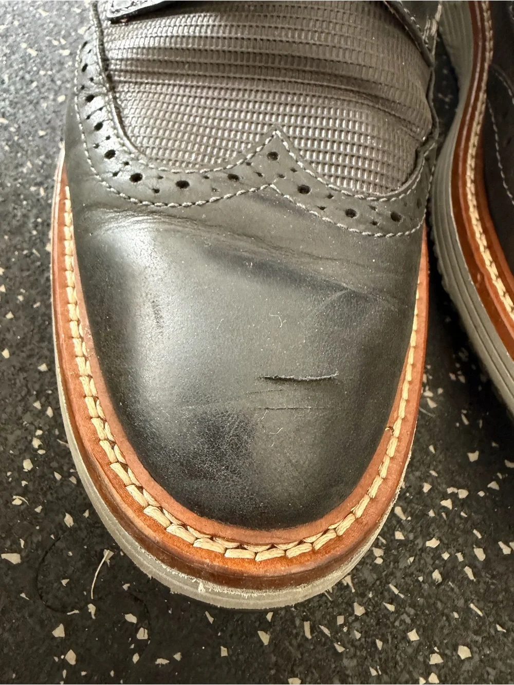 Johnston & Murphy Black Leather Wingtip Oxfords with Tan Welt